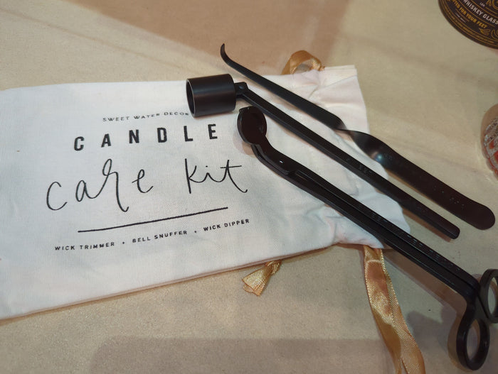Black Candle Care Kit with candles and accessories from Sweet Water Decor, featuring black candles and maintenance tools.