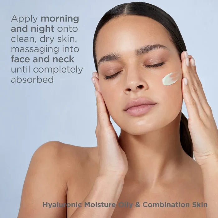Woman applying Hyaluronic Moisture Oily & Combination Skin moisturizer to face and neck