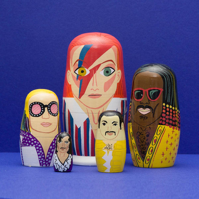 Larney + Babs 70s Men of Pop wooden nesting doll set, colorful retro gift with multiple nested wooden figures.