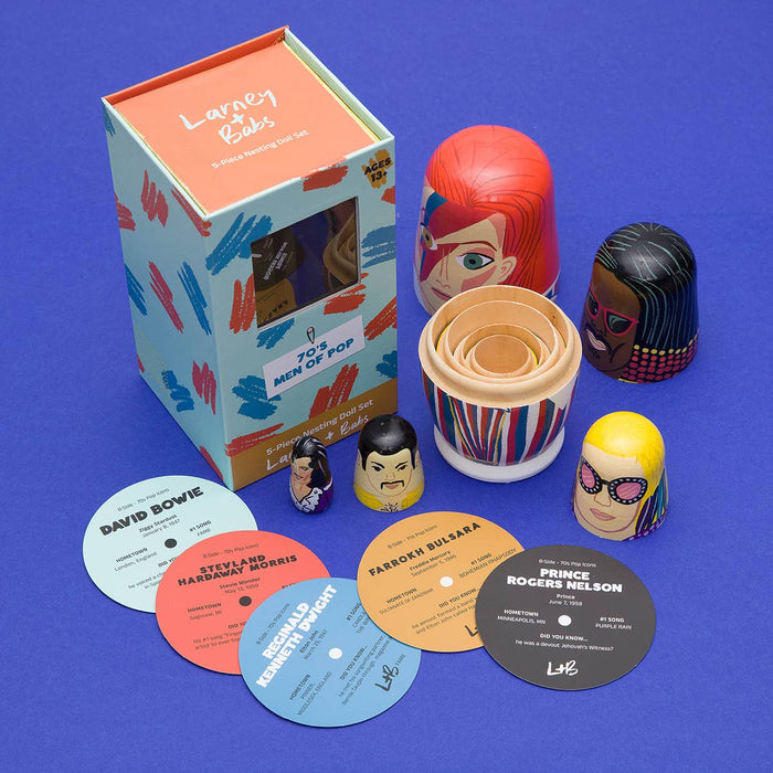Set of 70s Men of Pop wooden nesting dolls by Larney + Babs, featuring colorful vintage-inspired designs and traditional craftsmanship.