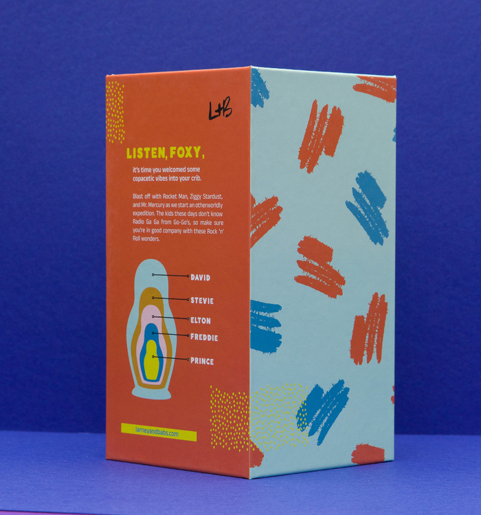 Colorful 70s Men of Pop wooden nesting doll set by Larney + Babs, featuring vintage-inspired miniature wooden figures in a gift box.