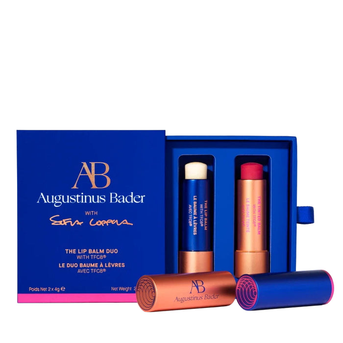 Augustinus Bader The Lip Balm Duo with Sofia Coppola, two lip balms in blue and gold packaging