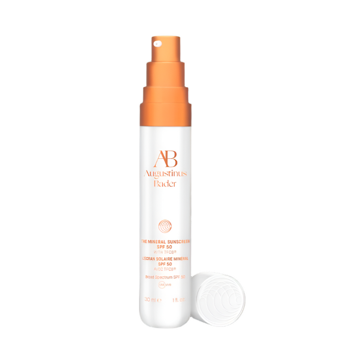Augustinus Bader The Mineral Sunscreen SPF 50 bottle with orange pump