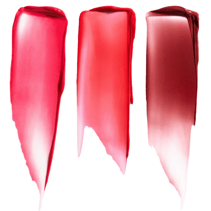 Three tinted balm swatches in coral, pink and berry shades