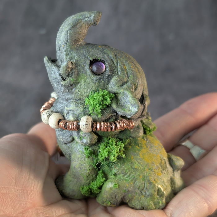 BABY BAKU FAUX STONE FIGURE