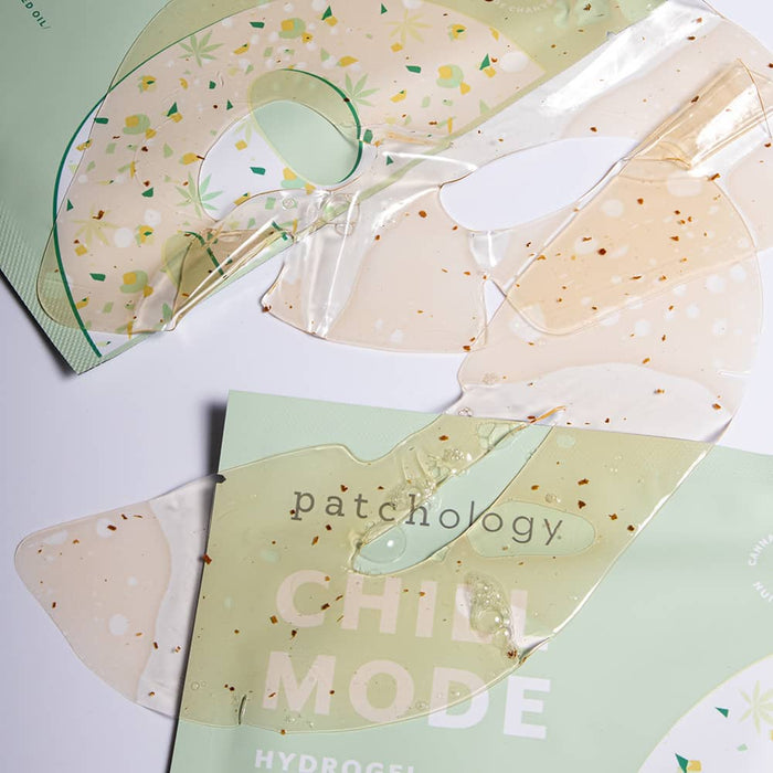 Patchology Chill Mode hydrogel face mask with gold flecks layered over green packaging.