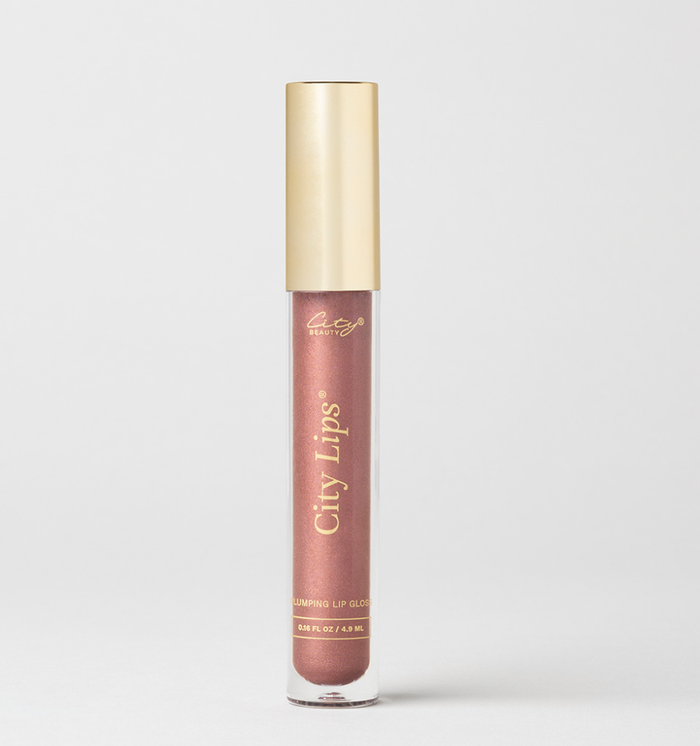 City Lips Plum Springs metallic lipgloss by City Beauty, showcasing shiny, metallic plum-colored lips with a smooth gloss finish.