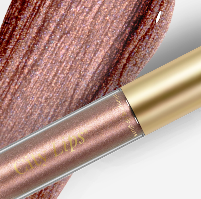City Lips Plum Springs metallic lipgloss by City Beauty showing shiny, smooth lips with a metallic purple finish.