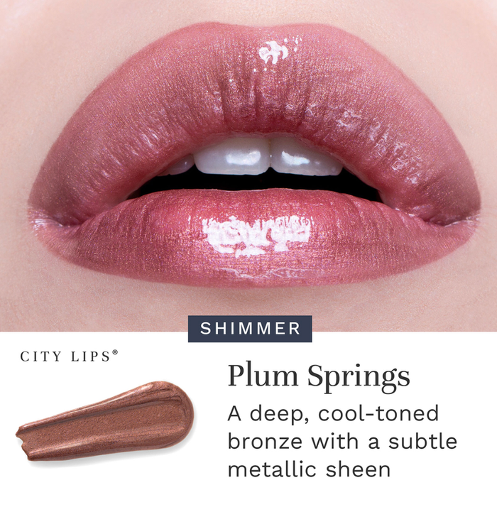 City Lips Plum Springs metallic lipgloss from City Beauty, featuring a shiny, reflective purple shade on smooth lips.