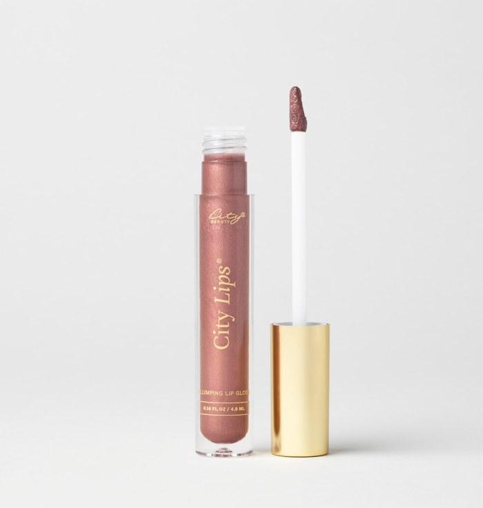 City Lips Plum Springs metallic lipgloss from City Beauty, shown on lips with a glossy, shimmering finish.