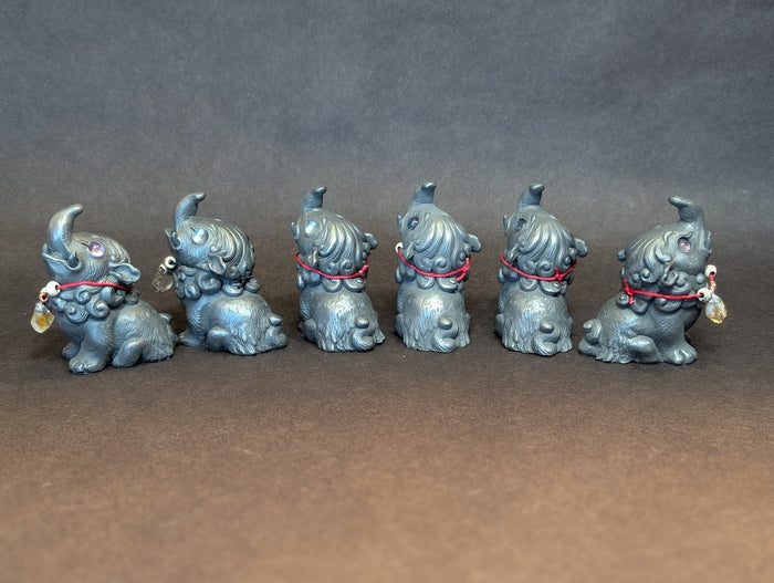 COLD CAST IRON BABY BAKU FIGURE
