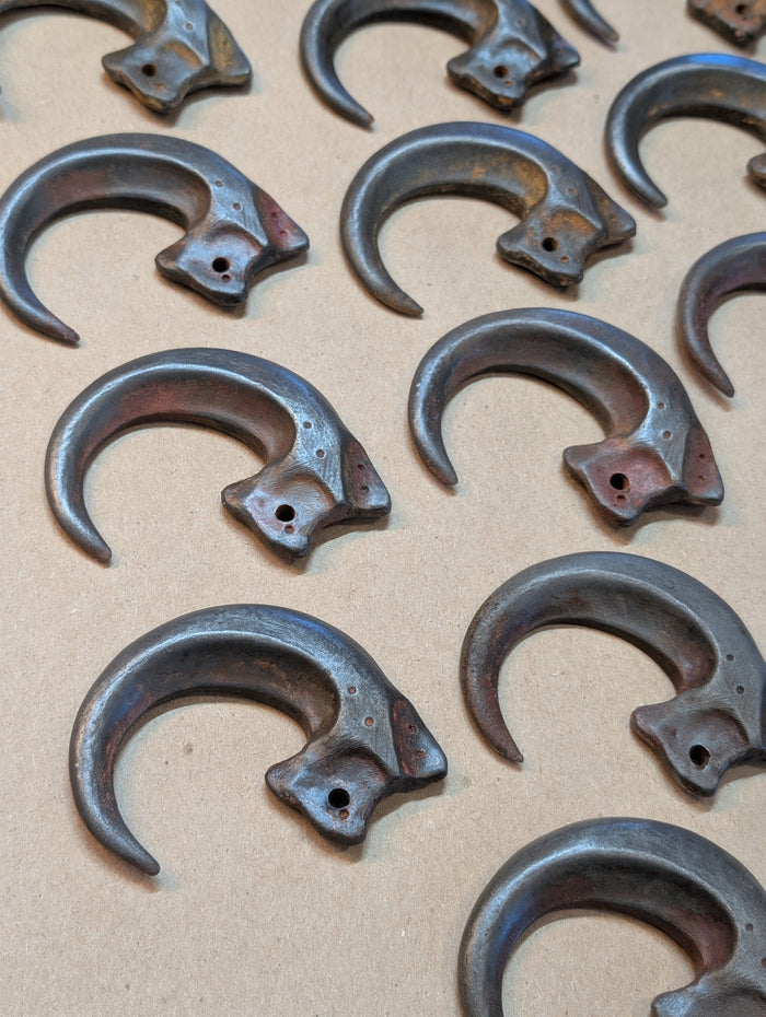 COLD CAST METAL CLAW PENDANT