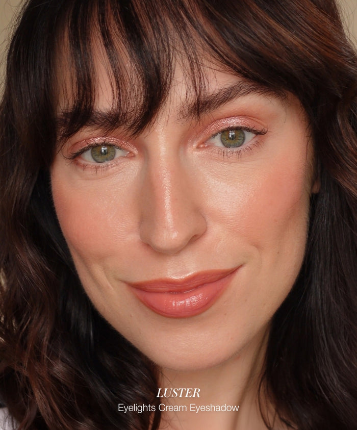 Close-up of a woman wearing soft rose-toned cream eyeshadow and natural makeup, highlighting the Color Capsule: The Rosé Edit collection with clean beauty and natural ingredients.