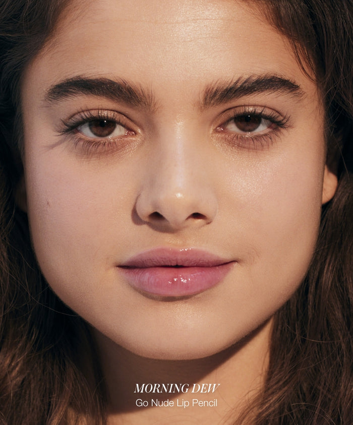 Close-up of a woman with natural makeup featuring soft rose-toned lips and clear skin, promoting Color Capsule: The Rosé Edit with clean beauty and cruelty-free makeup.