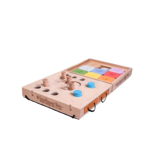 The MY INTELLIGENT PETS DOG TRAVEL PUZZLE 2 IN 1 is a portable dog toy with movable knobs, sliders, and compartments in natural wood tones and bright colors—ideal for interactive pet play on the go.