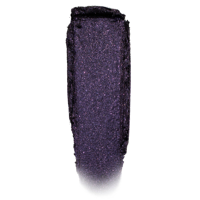 Deep violet-black, glittery eyeshadow swatch shimmering in a single swipe on a white background; Emo Inside Jelly Much Shadow by ColourPop, highlighting fine purple sparkle and the long-wear jelly texture of ColourPop Jelly Much Shadow.