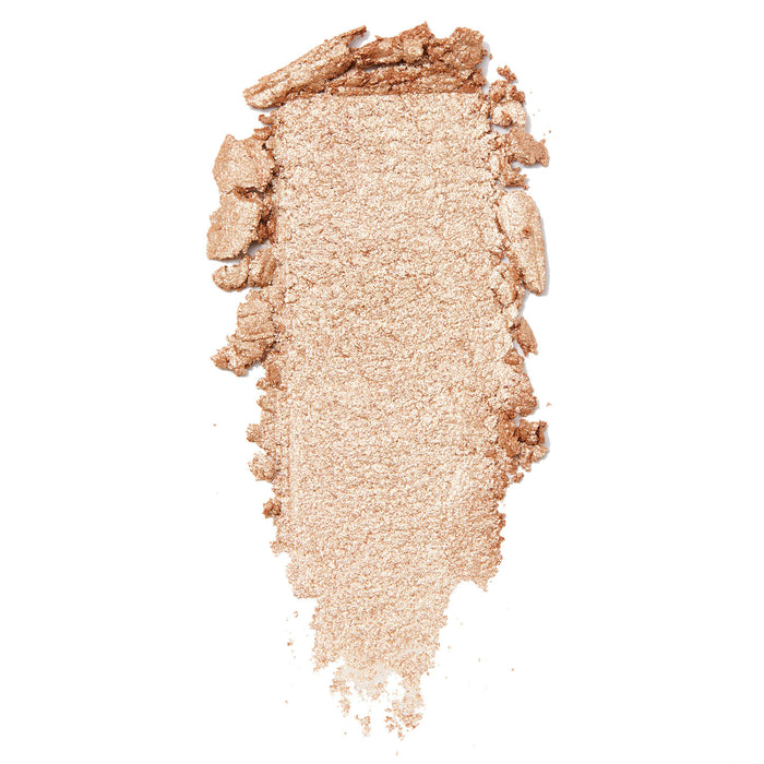 Flower Child ColourPop Super Shock Shadow swatch - shimmery champagne-peach eyeshadow smeared in a vertical strip, showing metallic payoff and creamy texture on a clean white background.