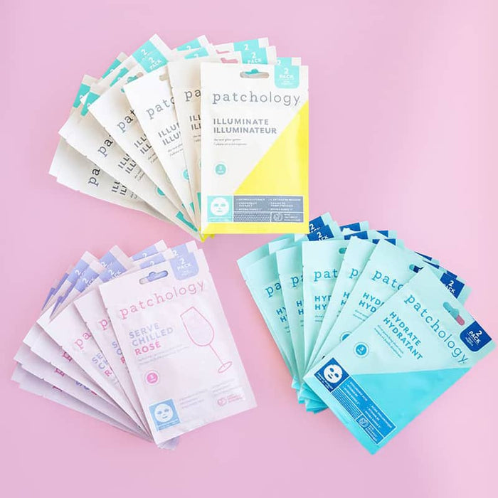 Assorted Patchology sheet mask packs arranged in three fanned groups on a pink background, featuring Illuminate, Serve Chilled Rosé, and Hydrate variants