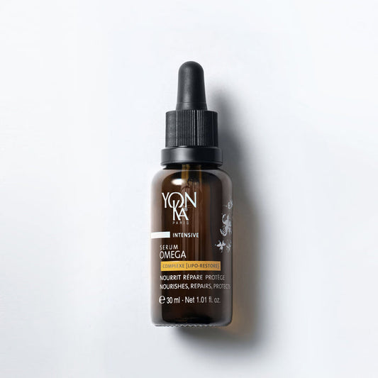 Yon-Ka Paris Serum Omega 30ml glass bottle with dropper showing golden oil-in-serum labeled Lipo Restore Complex Omegas 3 6 9