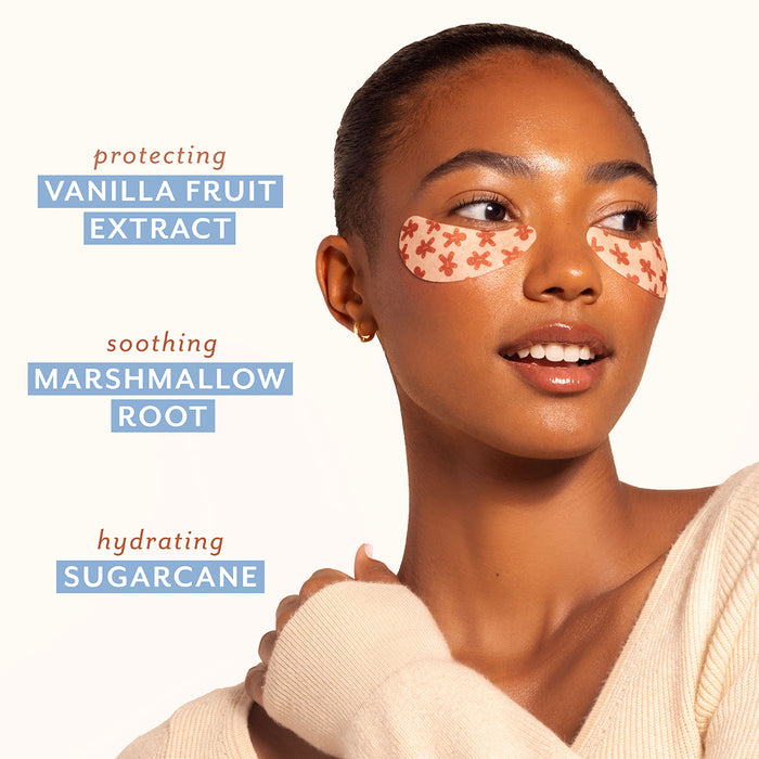 Woman with eye patches on a white background with text about ingredients. Protecting soothing and hydrating under eye patches.