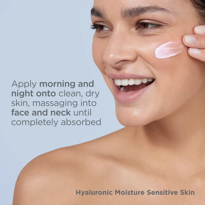 Woman applying Hyaluronic Moisture Sensitive Skin moisturizer to cheek, morning and night