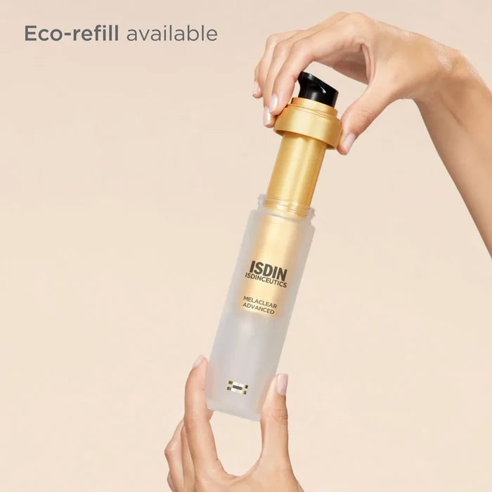 ISDIN Isdinceutics Melaclear Advanced eco-refill bottle being inserted into gold dispenser