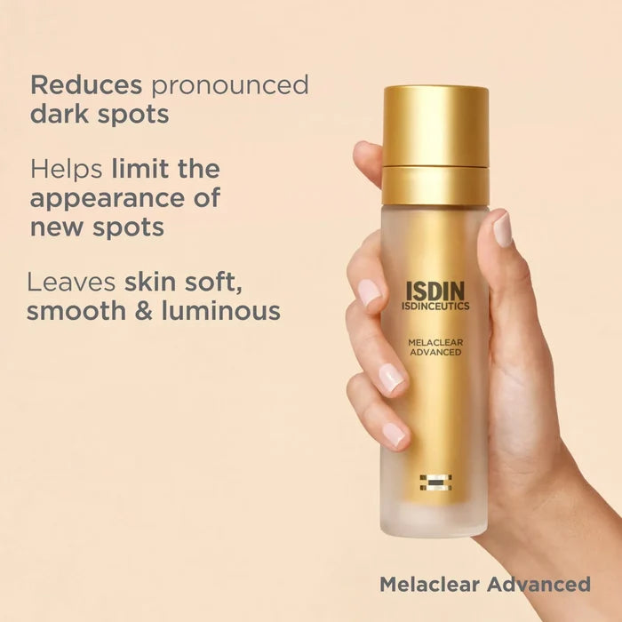 ISDIN Isdinceutics Melaclear Advanced serum bottle with gold cap, held in hand