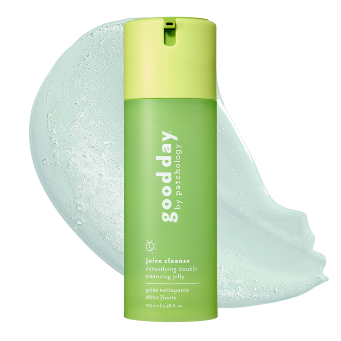 A bottle of Good Day by Patchology Juice Cleanses Detoxifying Double Cleansing Jelly in a light green and lime green color scheme, shown with a large translucent light green jelly smear behind it on a white background.