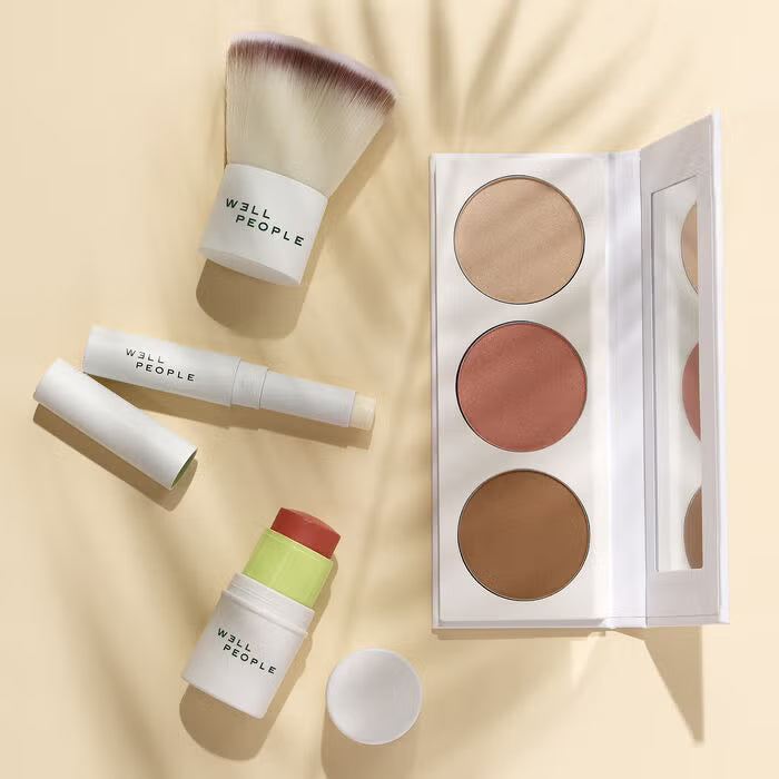 kabuki brush, lip balm, cream blush, face powder palette