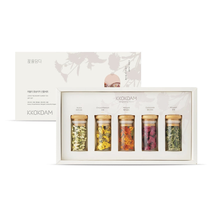 Flower tea gift set: six glass jars of dried blossoms in a display box
