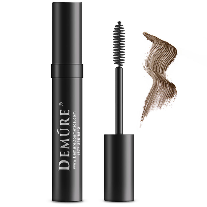 Tube of Demure  Brown Mascara with the applicator and a swatch
