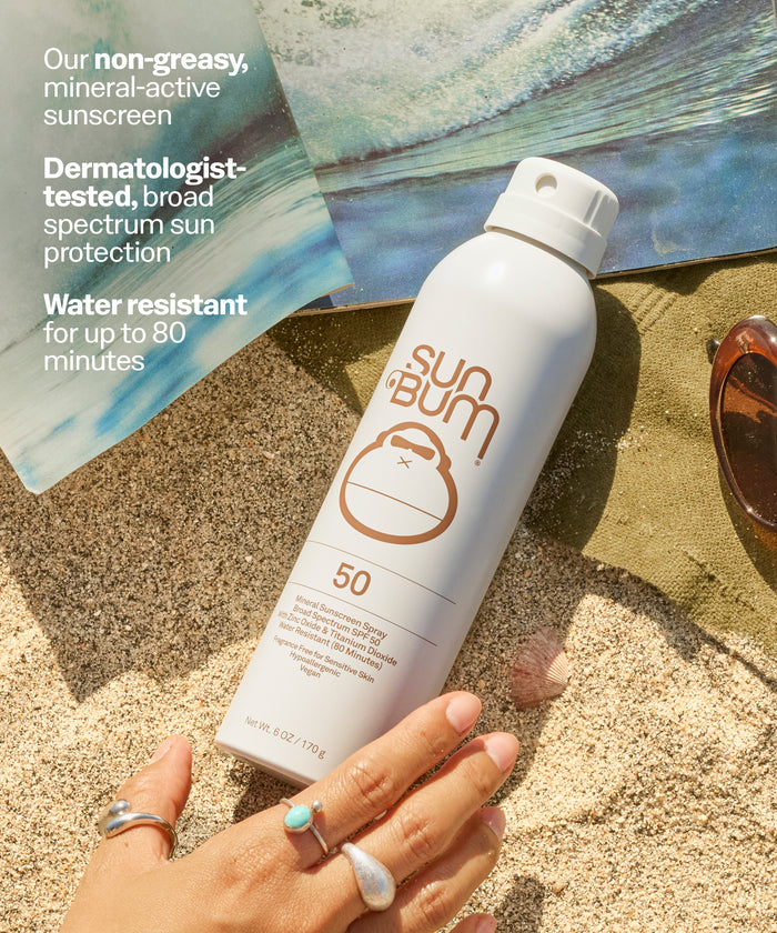 Sun Bum sunscreen bottle on sand with promotional text. Our non-greasy, mineral-active sunscreen
Dermatologist-tested, broad spectrum sun protection
Water resistant for up to 80 minutes