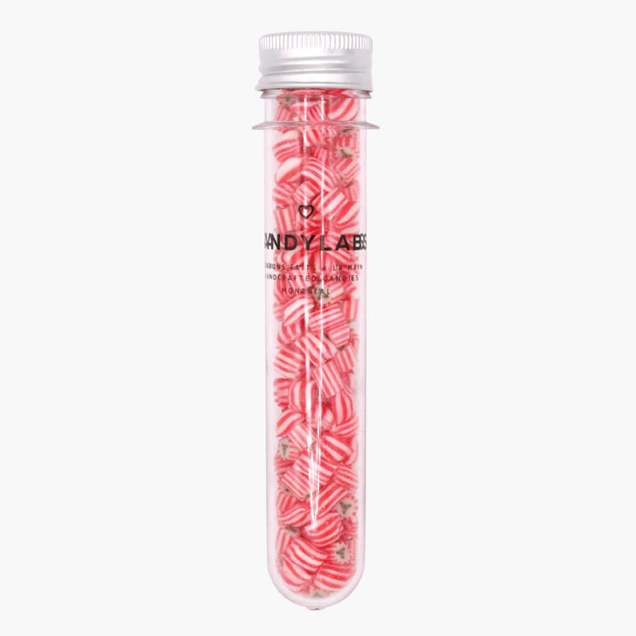 Clear candy tube filled with red-and-white peppermint twists