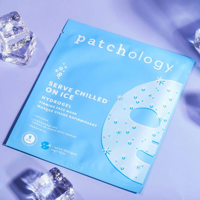 Serve Chilled On Ice Hydrogel Firming Face Mask packet displayed on a lavender background surrounded by ice cubes, emphasizing its cooling and refreshing skincare benefits.