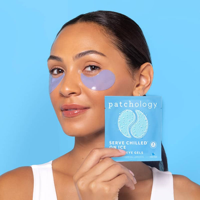 woman using on ice eye mask to firm and depuff undereyes serve chilled cooling eye patches in use