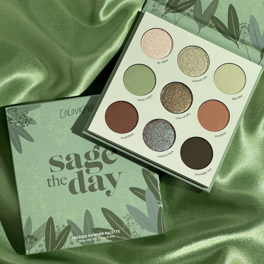 ColourPop Sage The Day pressed powder shadow palette opens to nine pans - sage greens, earthy browns, and shimmering golds - in matte and shimmer finishes, displayed on green satin beside its box; a ColourPop Shadow Palette.