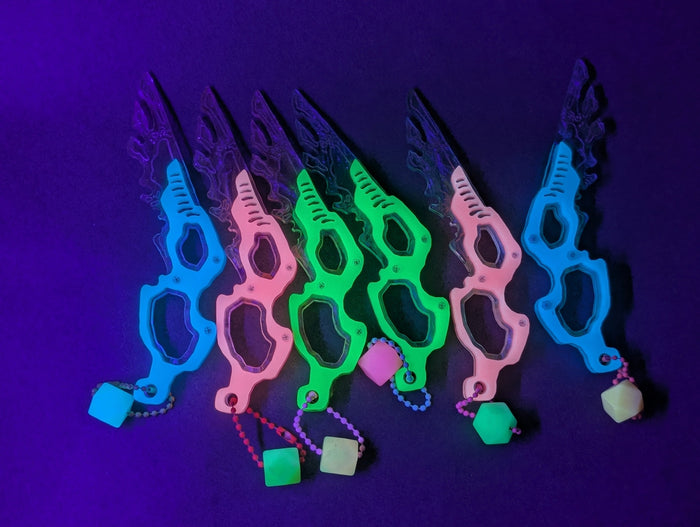 SEPIOID GALACTIC FEATHER GLOW CHARM