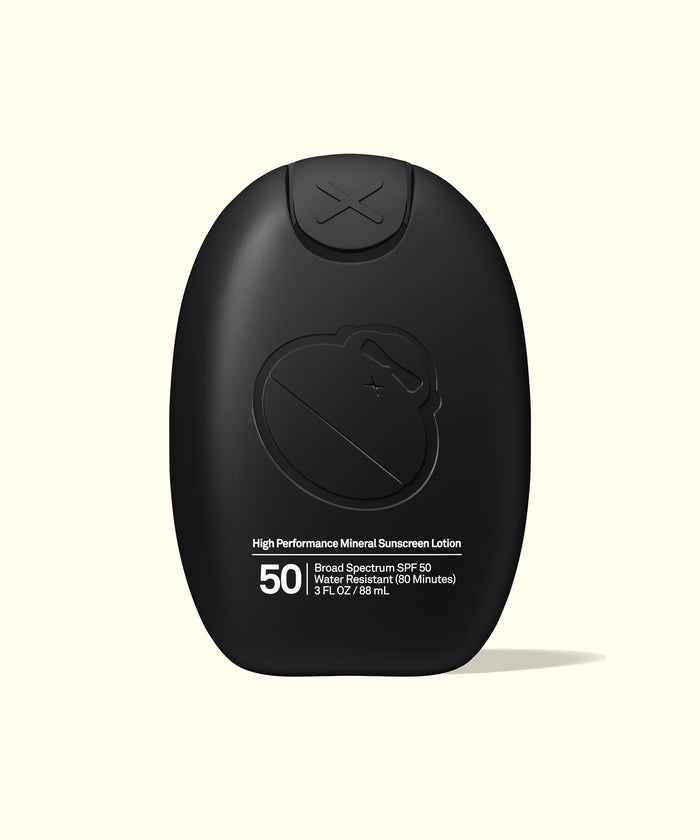 Black bottle of Sun Bum Signature SPF 50 Mineral Lotion with high performance mineral sunscreen, front view.