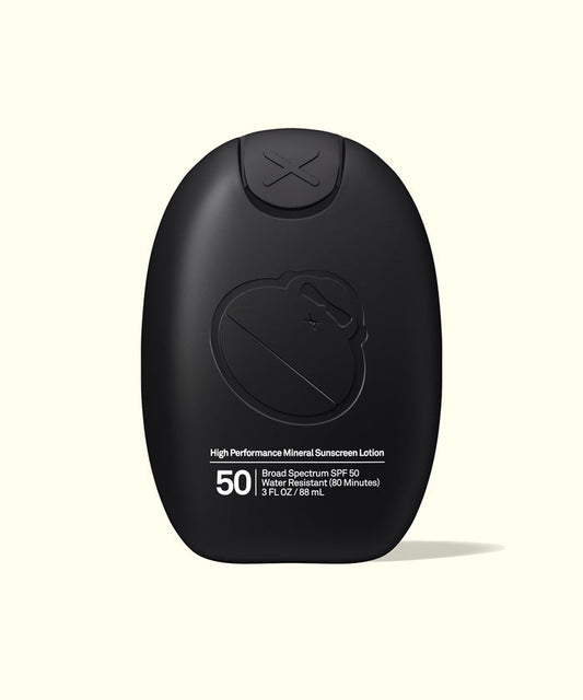 Black bottle of Sun Bum Signature SPF 50 Mineral Lotion with high performance mineral sunscreen, front view.