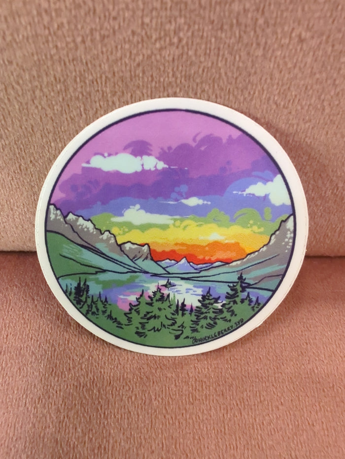Colorful Rainbow St Mary sticker by Sydney Boveng featuring vibrant rainbow design on a clear background.