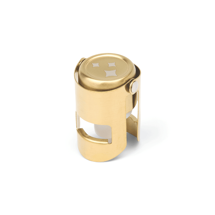 Gold champagne bottle stopper with decorative star button top