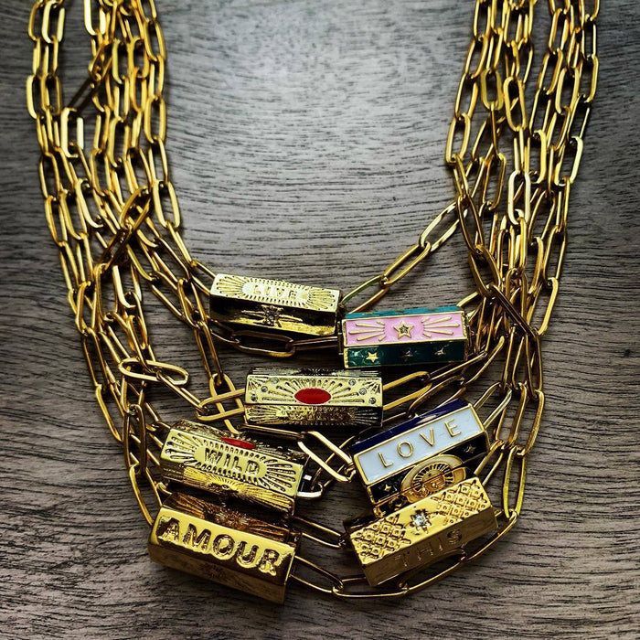 Chasing Cherubs Warhol Necklace featuring bold, colorful pendant with pop art style, displayed on a neutral background.