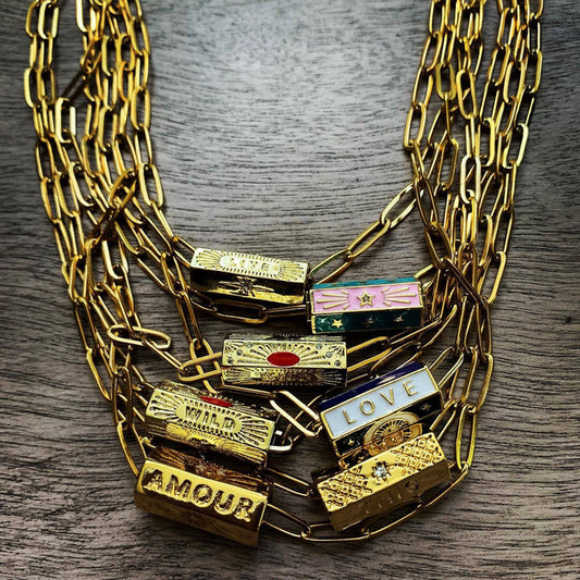 Chasing Cherubs Warhol Necklace featuring bold, colorful pendant with pop art style, displayed on a neutral background.