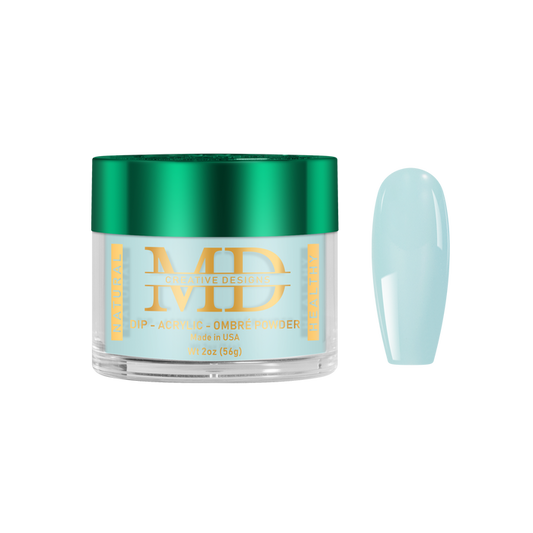 Jar of light blue powder with a green lid on a white background