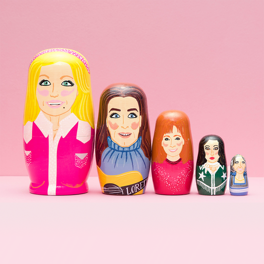 Set of six Women of Country wooden nesting dolls by Larney + Babs, colorful handcrafted gift collection for home decor and collectors.