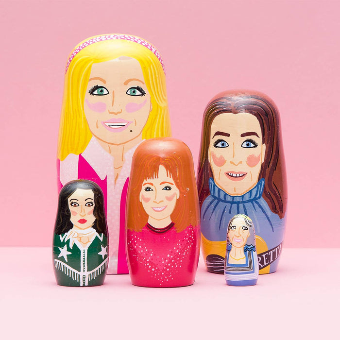 Women of Country wooden nesting doll set by Larney + Babs, featuring colorful handcrafted figures in traditional attire.